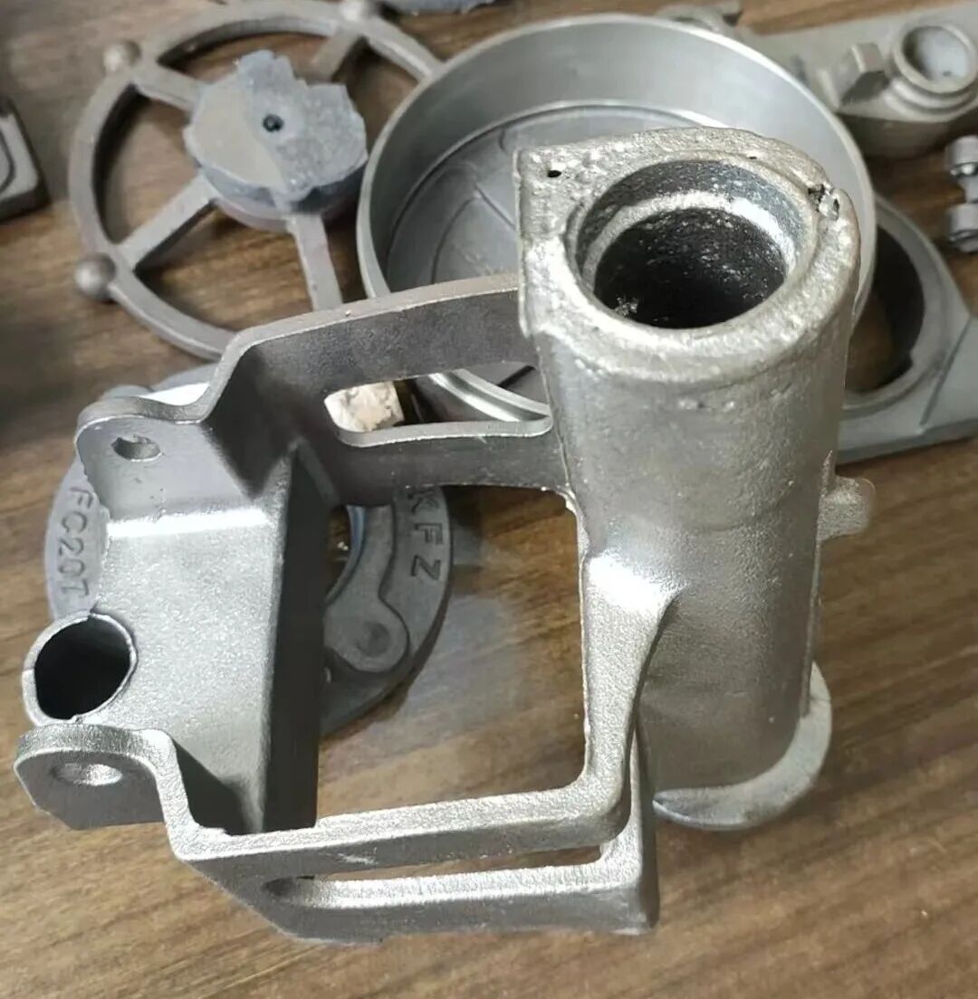 Behandling for alvorlig porøsitet i sylindriske rørformede sandkjerner under produksjon av duktile jerndeler ved bruk av grønn sandstøpeteknologi